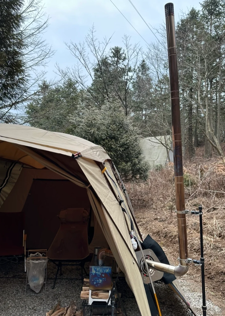 Cómo instalar un tubo de humos en una estufa de lona